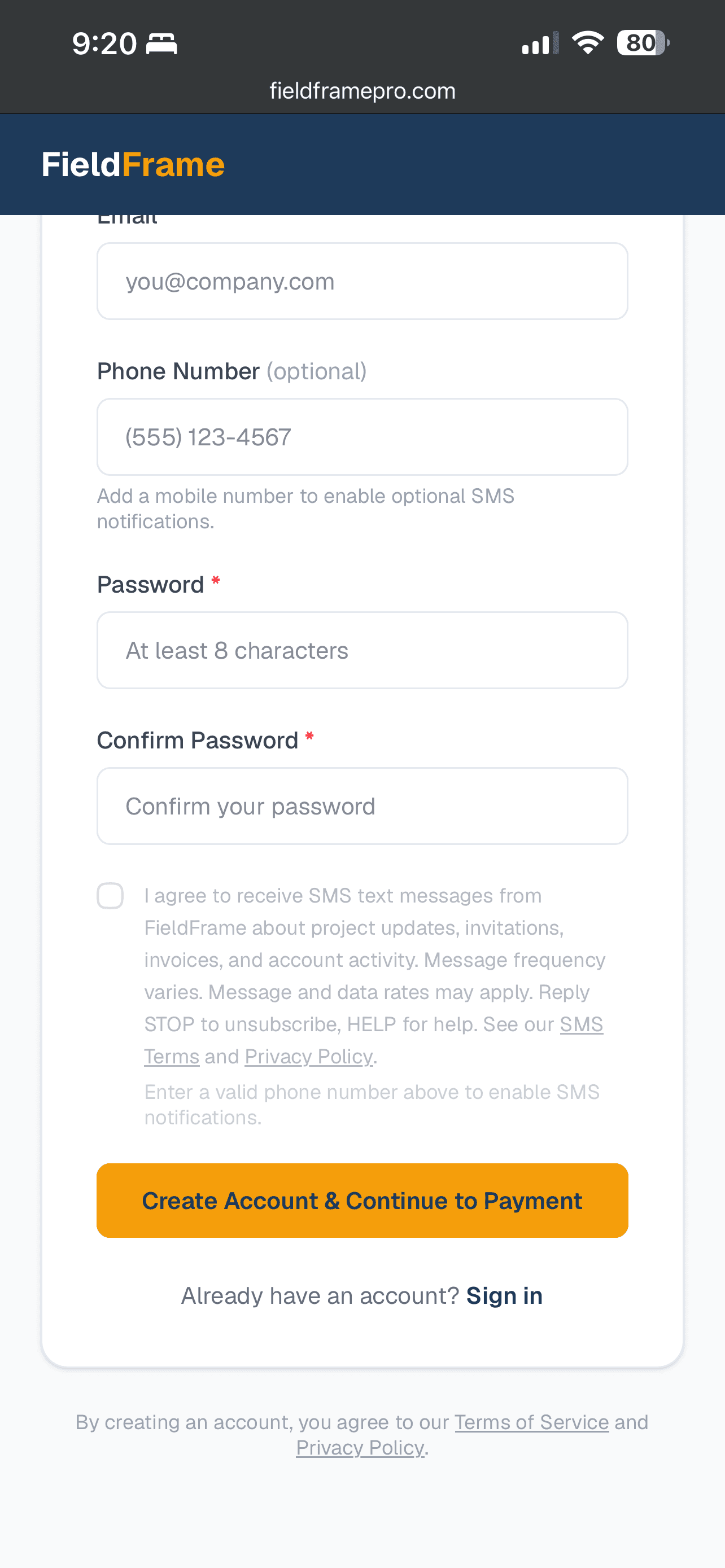 FieldFrame website signup form showing the phone number field and an unchecked SMS consent checkbox with the canonical consent disclosure visible.
